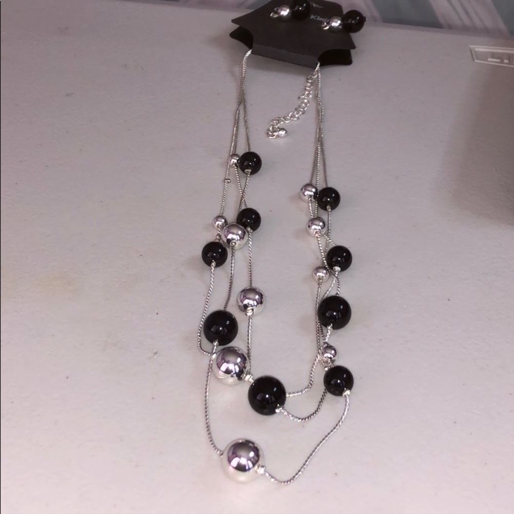 Brand new necklace with matching earrings
